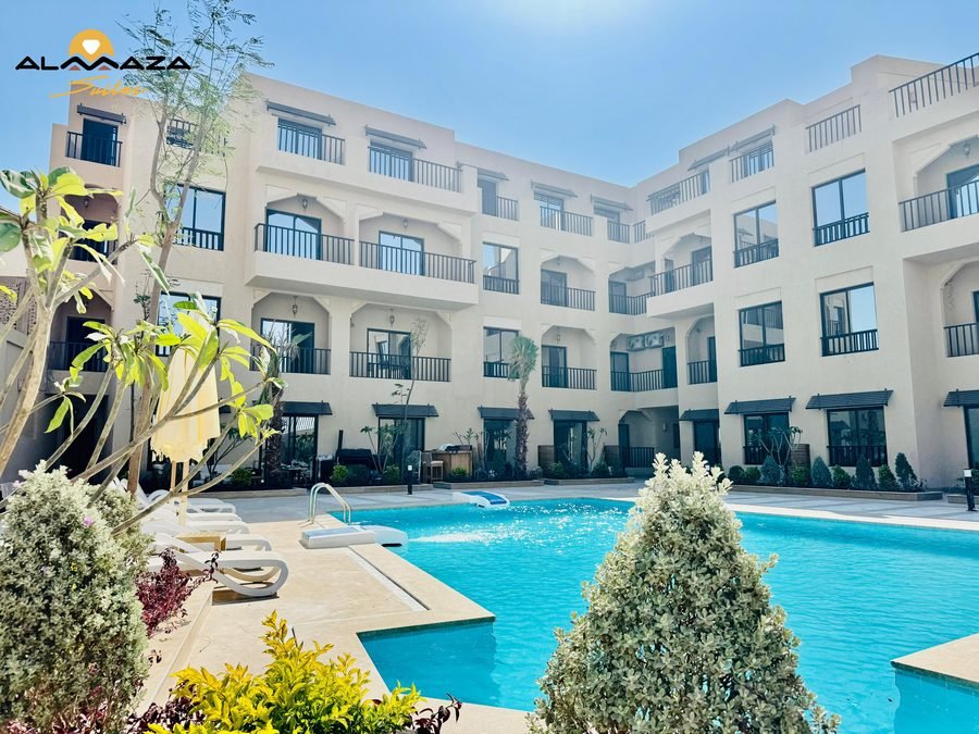 Almaza Suites — pool and apartment blocks