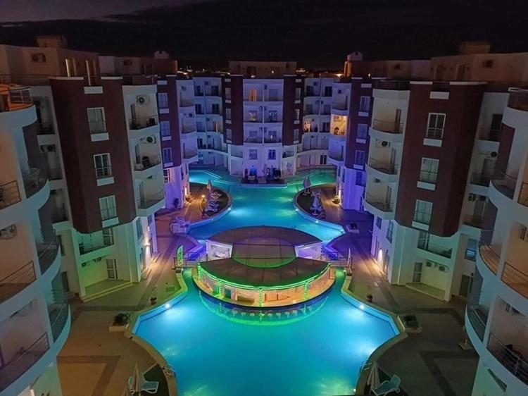 Aqua Palms Resort — the pool lit at night