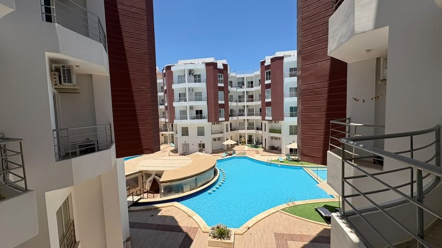 The pool at Aqua Palms seen from the studio balcony